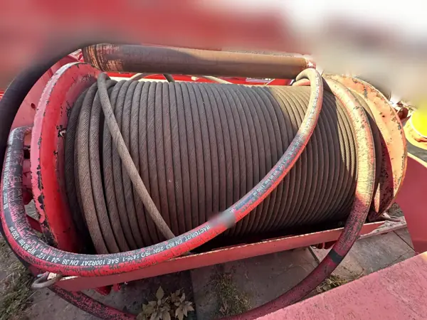 Corroded hoist rope on a winch drum of a Demag CC 2400 crawler crane after storage