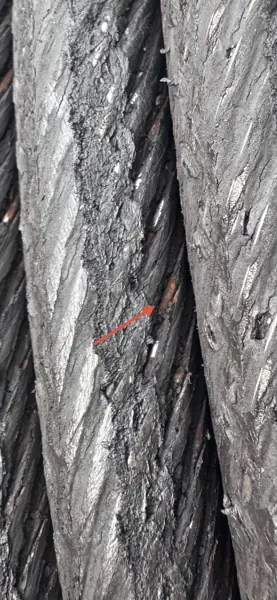 Corrosion between the strands of a Jaso J380PA hoist rope, hidden under excess grease