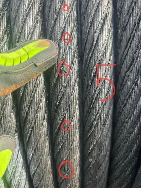 Five fatigue wire breaks circled in red on a Liebherr 357 HC-L luffing rope