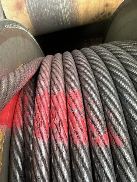 Liebherr HS 8100 boom hoist wire rope with broken wires marked in red at the Lebus drum cross-over