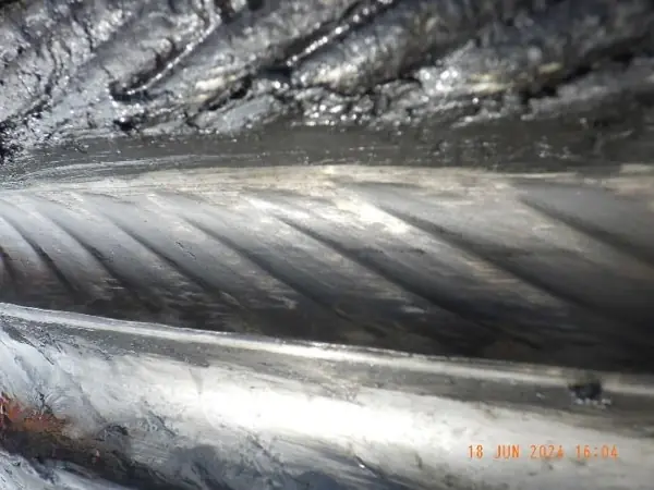 Negative rope imprints in the hoist drum grooves of a Liebherr RTG container crane
