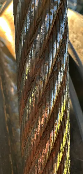 Rust in the strand valleys of a Terex CTL 630 tower crane luffing rope