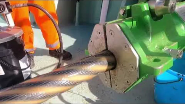 Viper lubricator pressure greasing a crane rope