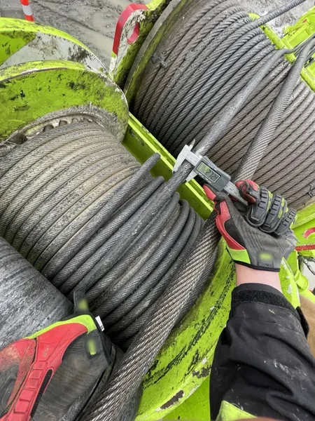 Caliper measuring the service winch rope on a Bauer BG 55