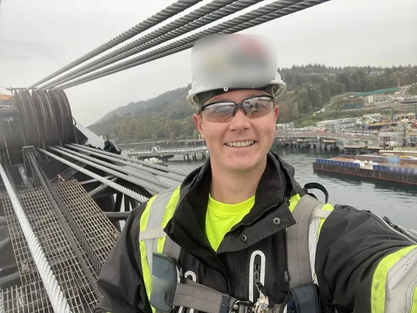 Dean McDonald among the boom hoist ropes and sheaves of a Clyde 700 t floating crane