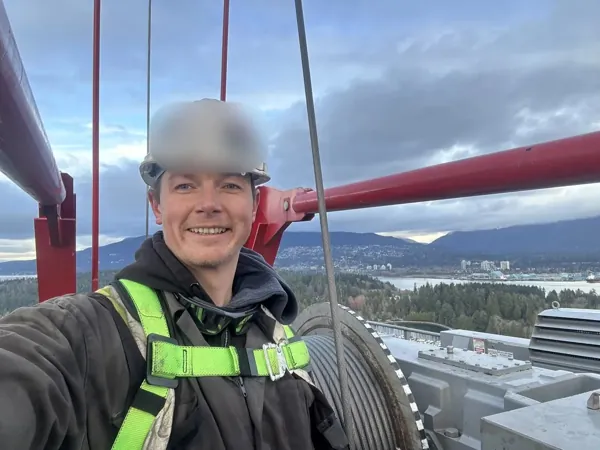 Dean McDonald at the winch of a Potain MR 615 luffing tower crane