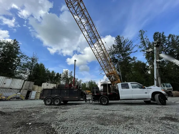 Truck and trailer with reels of new hoist rope for a Liebherr HS 855 rope change-out
