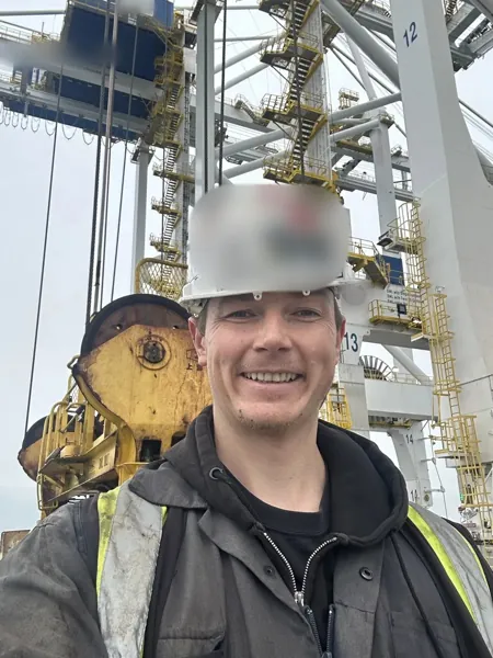 Dean McDonald by the headblock of a ZPMC ship-to-shore container crane