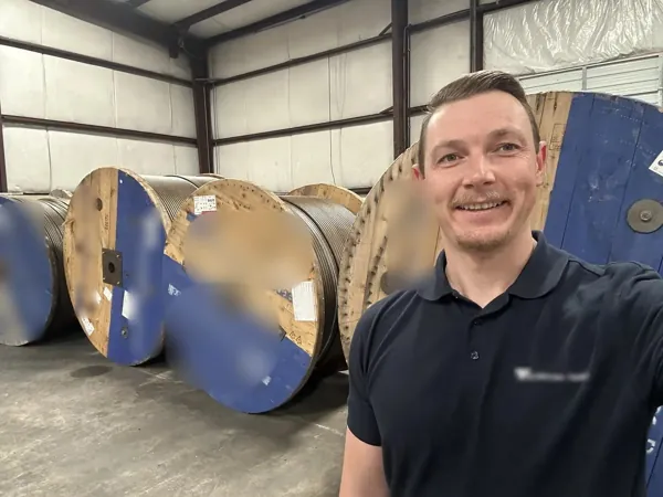 Dean McDonald beside reels of Teufelberger-Redaelli crane rope